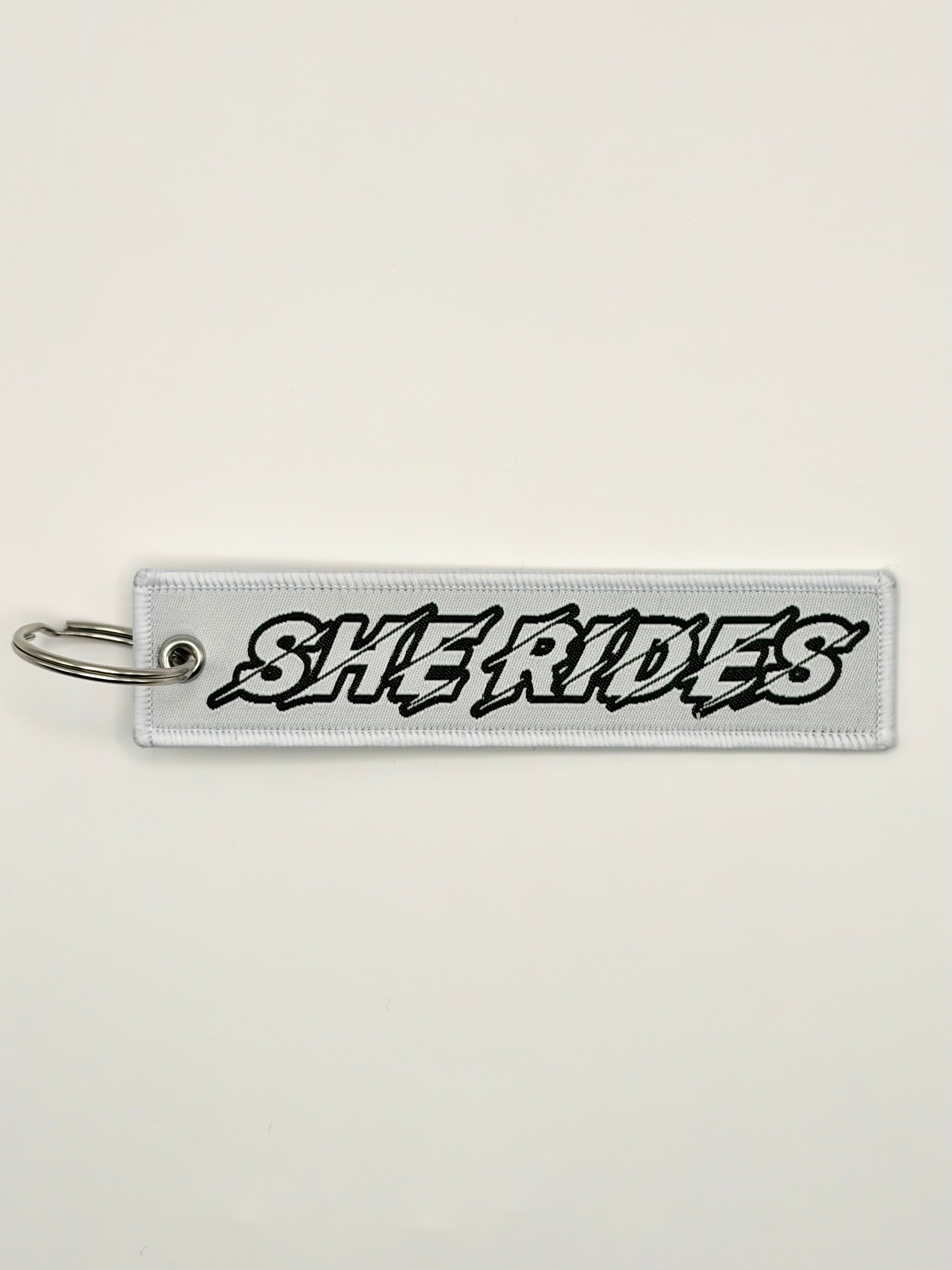 She Rides keychain black