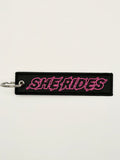 She Rides keychain pink