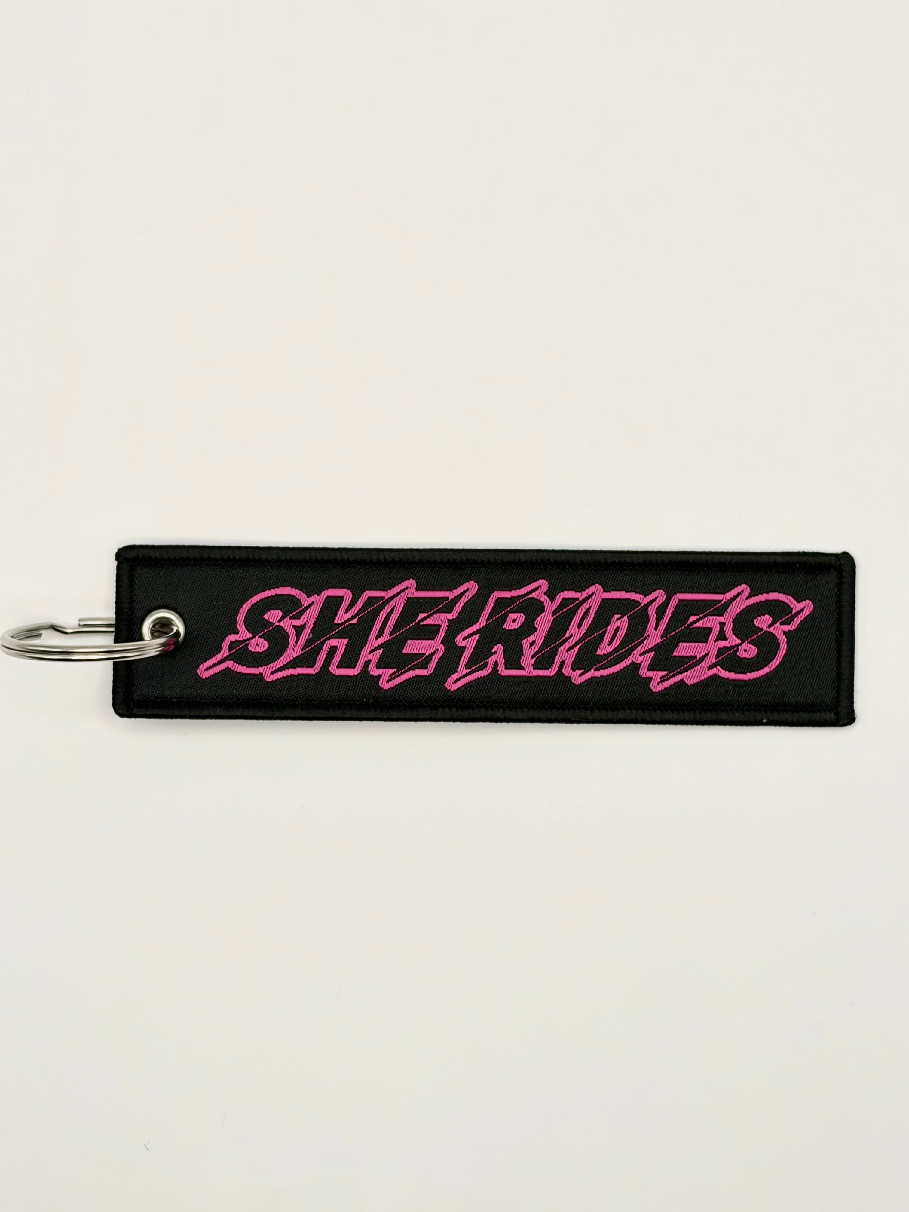 She Rides keychain pink